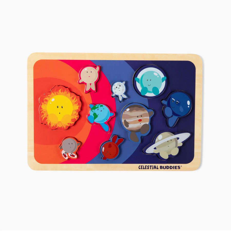 Children's puzzle with colorful celestial-themed wooden pieces on a white background